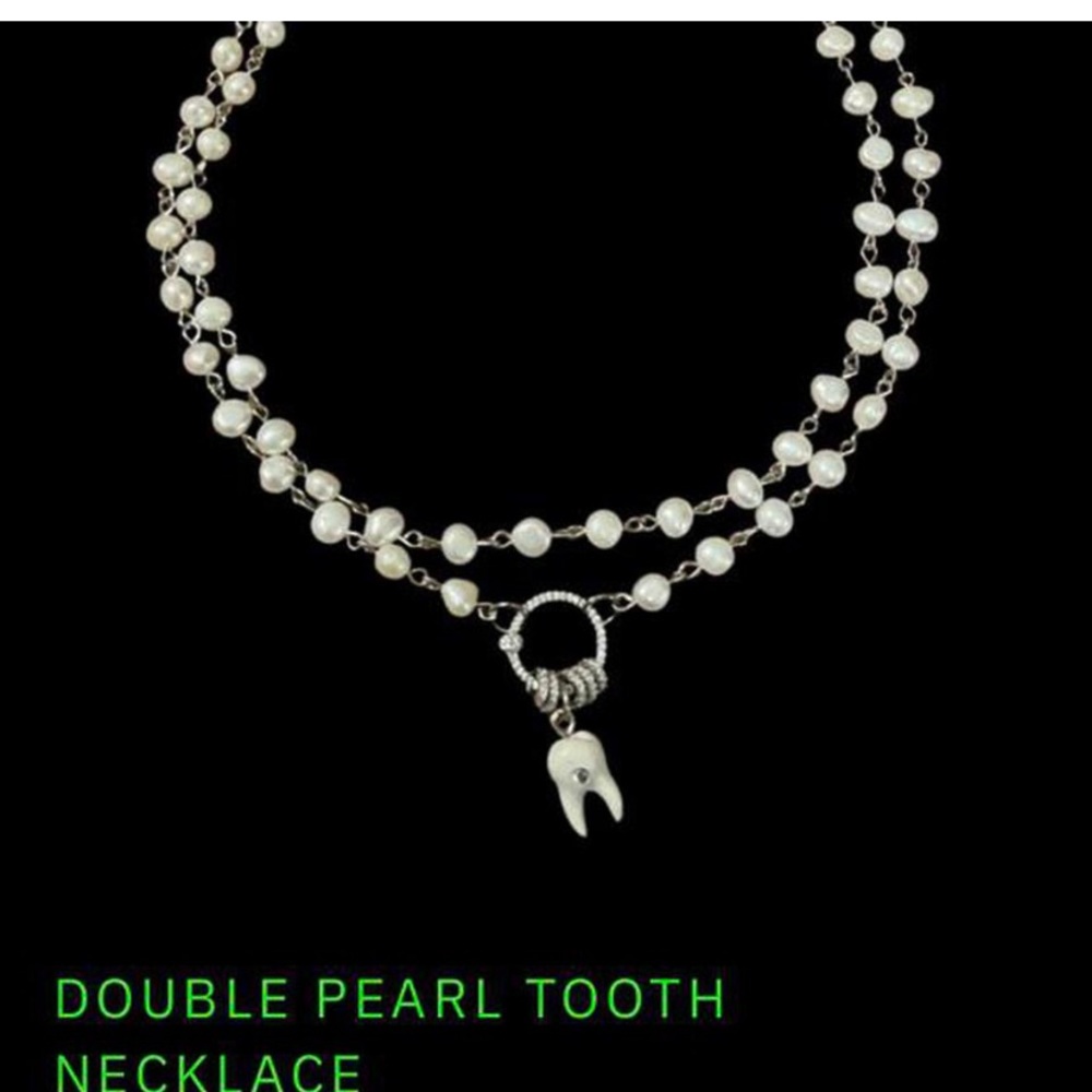 Olivia rodrigo tooth necklace taking offers